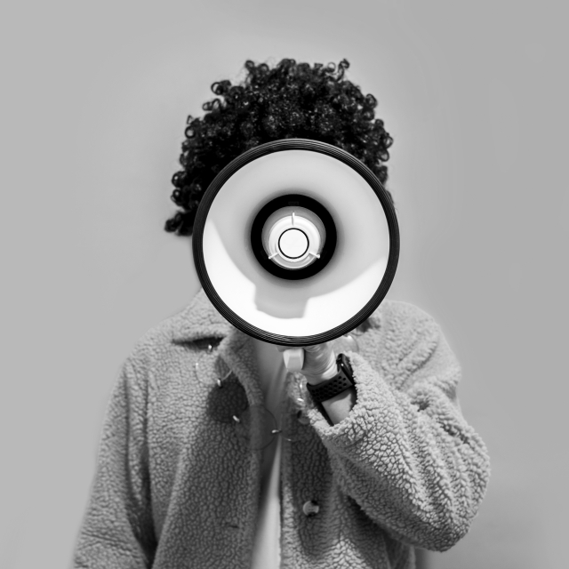 person holding megaphone